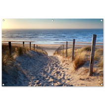 Tuinposter van het strand en de zee in Nederland met duinen, zon in liggend formaat.