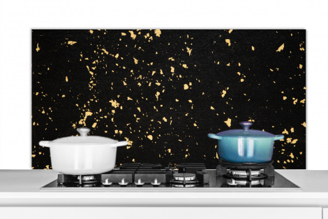 Spritzschutz Küche - Goldene Flocken auf schwarzem Hintergrund-1