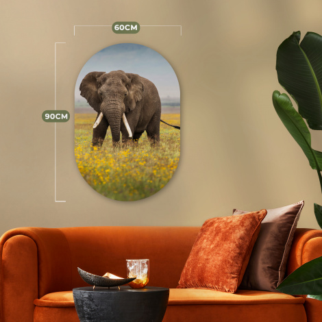 Muurovaal - Grazende olifant in een grasveld met bloemen-thumbnail-5