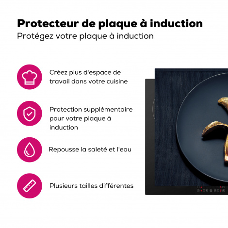 Protège-plaque à induction - Banane dorée sur un fond sombre-3