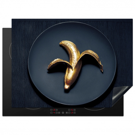 Inductiebeschermer - Gouden banaan op een donkere achtergrond