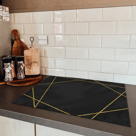 Herdabdeckplatte Geometrisches Muster aus goldenen Linien auf schwarzem Hintergrund-5