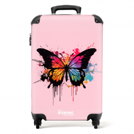 Koffer - Vlinder met verf op roze achtergrond