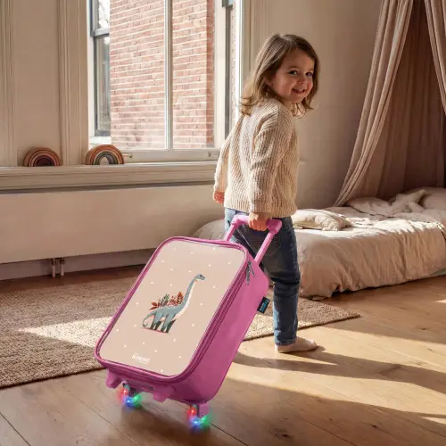 Blauwe dinosaurus op een beige stippenachtergrond Kinderkoffer - Roze klein -sfeer1