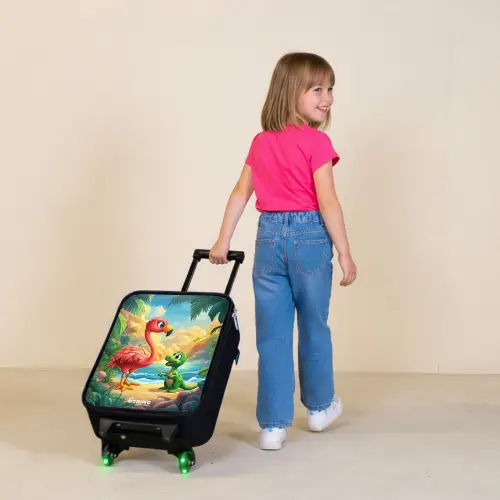 Flamingo en dinosaurus op strand bij ondergaande zon Kinderkoffer - Zwart klein -sfeer1