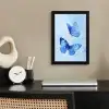 Vlinders - Sierlijk - Blauw fotolijst zwart zonder passe partout klein -sfeer1