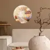 Vlinder - Bloem - Oranje Wandcirkel behangsticker klein -sfeer1