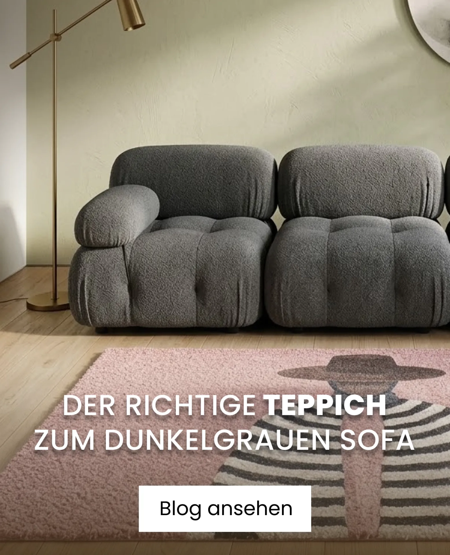 dunkelgrauen sofa met rosa teppich