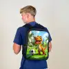 Dino met een voetbal in groen landschap Rugzak - Zwart middel -sfeer8