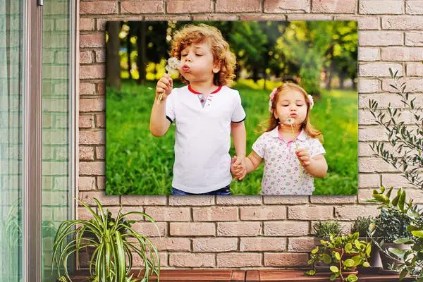 Foto op aluminium voor buiten aan stenen muur