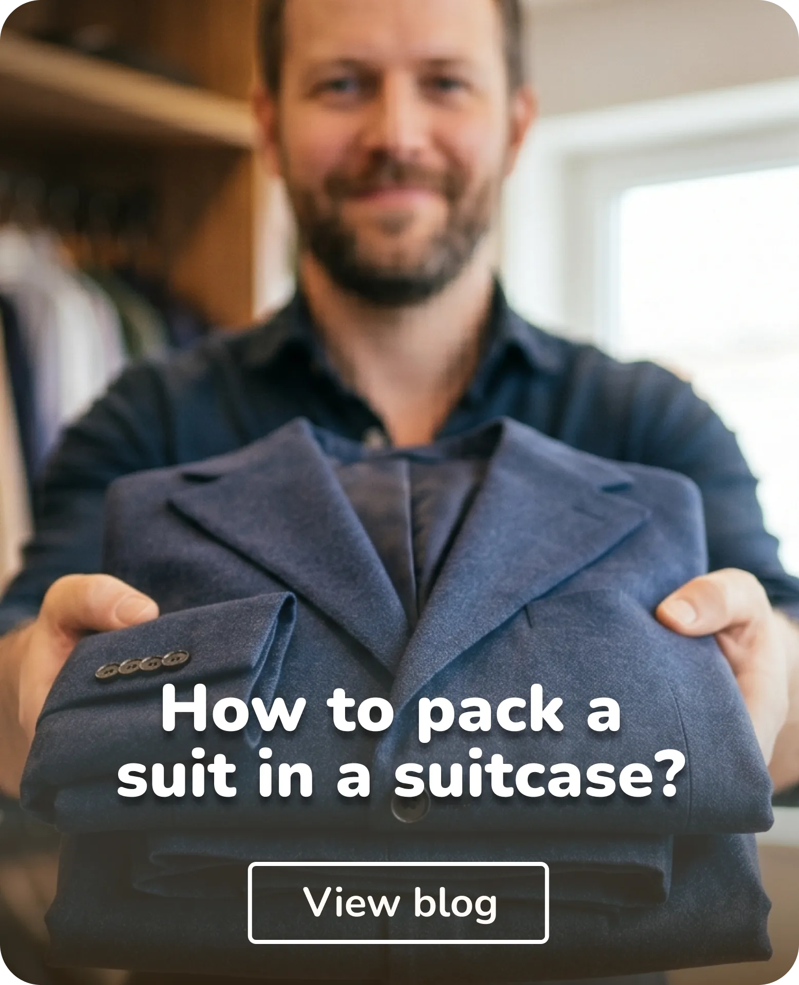 man with suit in his hands