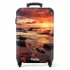 Rotsachtig strand bij zonsondergang NBS - Handbagage koffer - Unisex middel -productfoto_recht