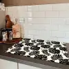Modern - Monstera - Zwart Inductie beschermer vinyl 3mm klein 276 -sfeer3