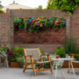 Bloemen - Muur - Groen - Oranje Tuinposter op houten frame 2 cm dik xxl -sfeer3