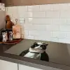Kat - Kokskleding - Zwart - Wit Inductie beschermer vinyl 3mm klein -sfeer3
