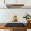 Boeken - Stapel - Bloemen - Kleurrijk keuken achterwand spatscherm klein -sfeer2