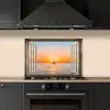 Doorkijk - Zee - Boot - Zonsondergang keuken achterwand spatscherm klein -sfeer1