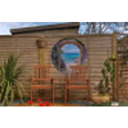 Doorkijk - Poort - Zee - Strand - Rotsen Wandcirkel tuinposter met ringen klein -buiten3