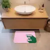Groen - Teskt - This is art - Roze Badmat klein -sfeer1