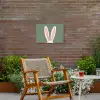 Hazen - Oren - Roze Tuinposter op houten frame 2 cm dik klein -sfeer3
