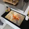 Close up - Oranje - Iris Inductie beschemer met haakjes klein -sfeer1
