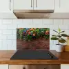 Bloemen - Muur - Groen - Oranje keuken achterwand spatscherm klein -sfeer2
