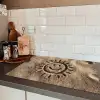 Gezichtje - Zon - Zand - Getekend Inductie beschermer vinyl 3mm klein -sfeer3
