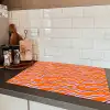 Retro - Golvend - Oranje Inductie beschermer vinyl 3mm klein 276 -sfeer3