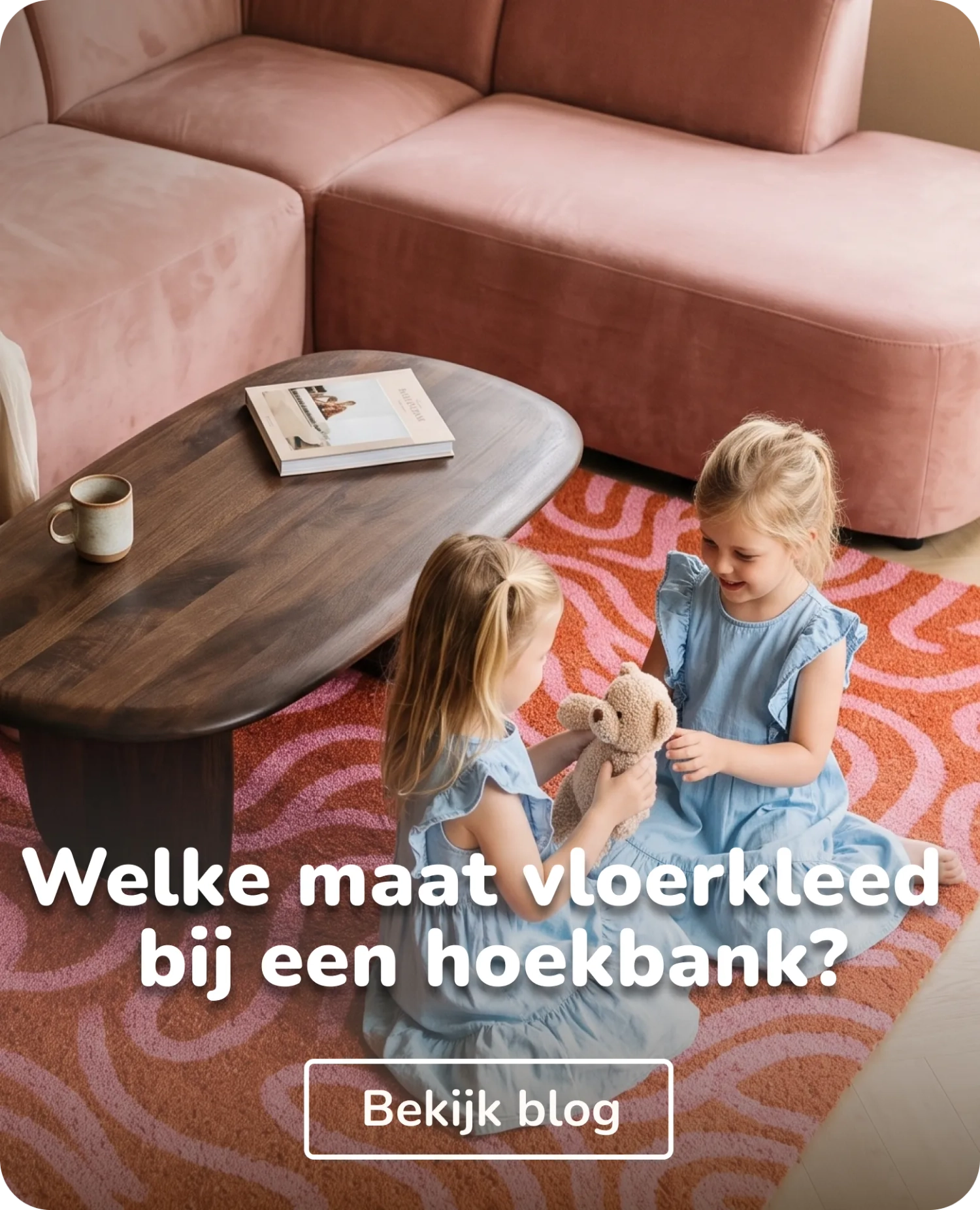 roze oranje vloerkleed bij roze hoekbank