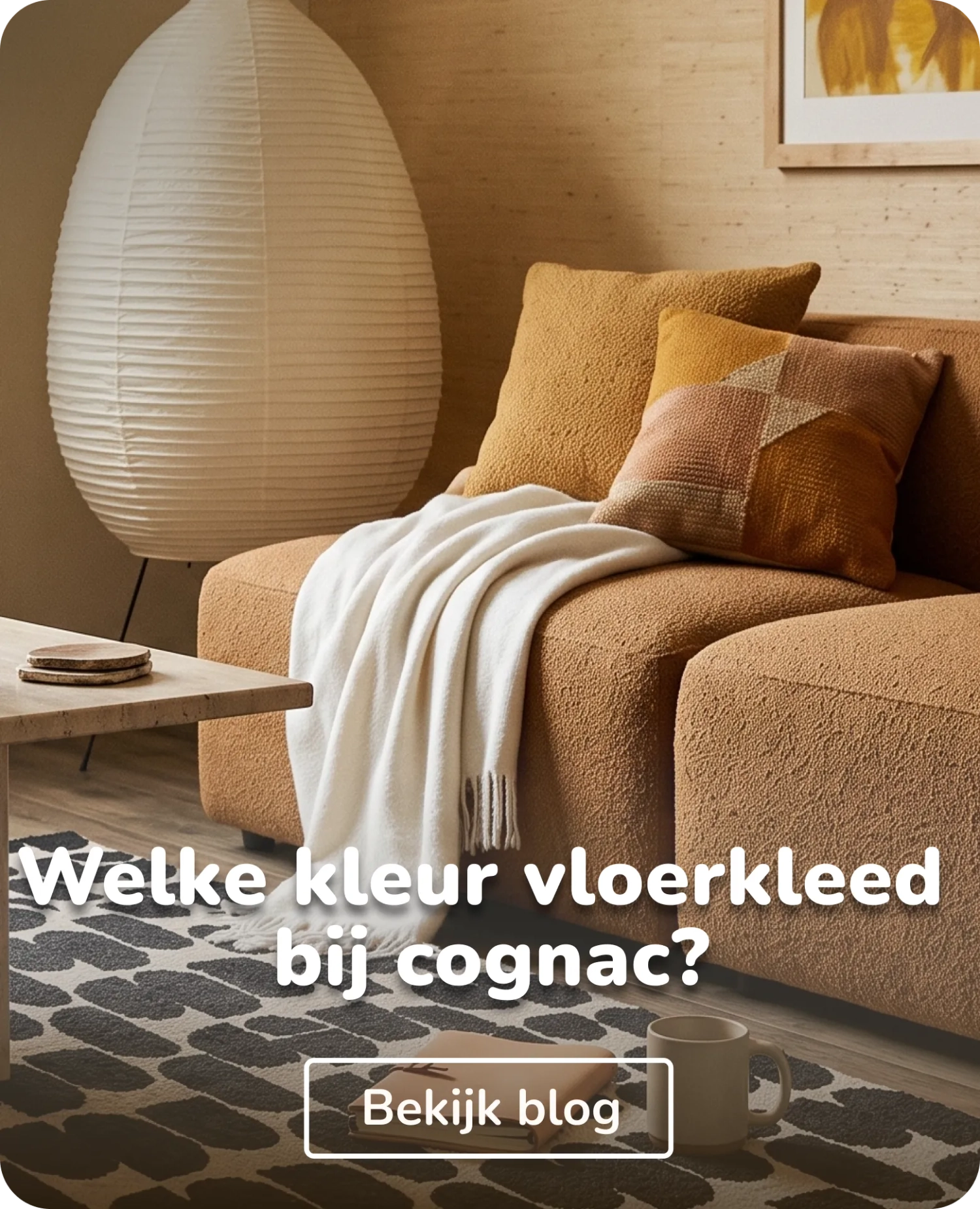 zwart wit vloerkleed met cognac bank