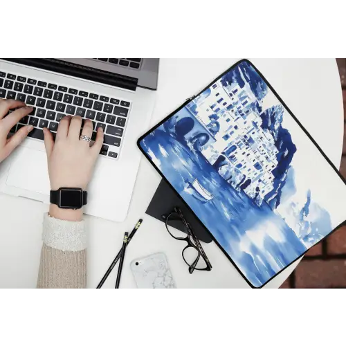 Dorp - Rotswand - Roeiboot - Water laptophoes neopreen klein -bureau