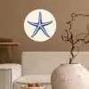 Blauwe zeester - Minimalistisch - Beige Wandcirkel behangsticker klein -sfeer1