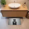 Otter - Wc-borstel - Bril - Zwart - Wit Badmat klein -sfeer1