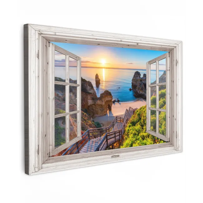 Buiten canvas - Uitzicht op Rotsachtig Strand bij Zonsondergang