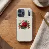 Kerststuk - Poinsettia - Dennenappels - Rood Telefoonhoesje iPhone 17 Pro Max klein -sfeer1