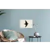 Zwarte zwaluw - Gouden accenten - Lichte achtergrond Muursticker klein -plant
