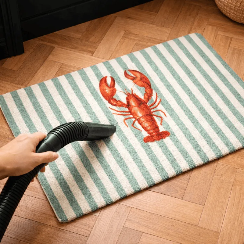 Deurmat schoonmaken - stofzuigen